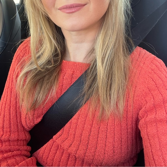 cropped, ribbed knit sweater in a vibrant orange-red color - Picture 3 of 3